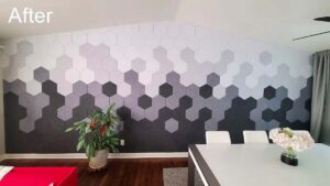 Hexagonal decorative acoustic panels in multiple colours on the wall