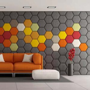 Hexagonal decorative acoustic panels in multiple colours on the wall