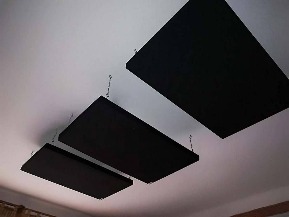 Black suspended ceiling soundproof panels mounted with chains